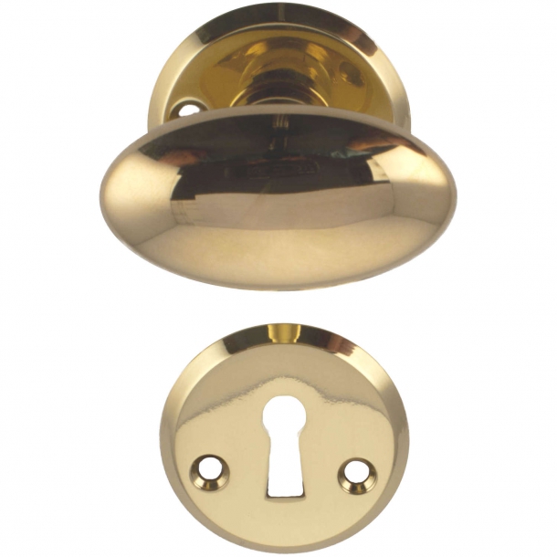 Door handle brass almondshaped rosette and escutcheon BRASS door