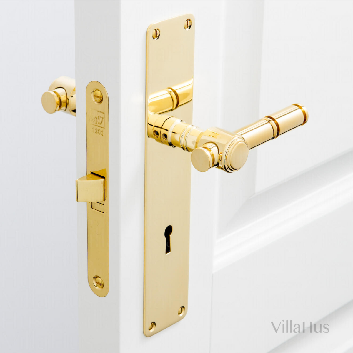 Door handle on backplate with keyhole Brass without lacquer Model